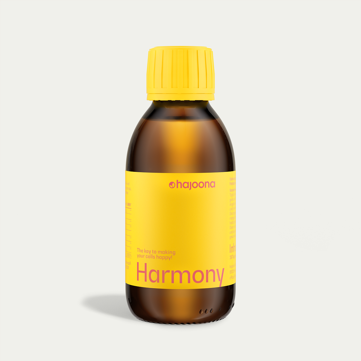 Braune Glasflasche mit gelbem Etikett und gelbem Schraubverschluss – hajoona Harmony. Die Aufschrift lautet: ‚The key to making your cells happy.‘ Entwickelt zur Unterstützung von Zellgesundheit, Omega-3-Versorgung und Gelenken.